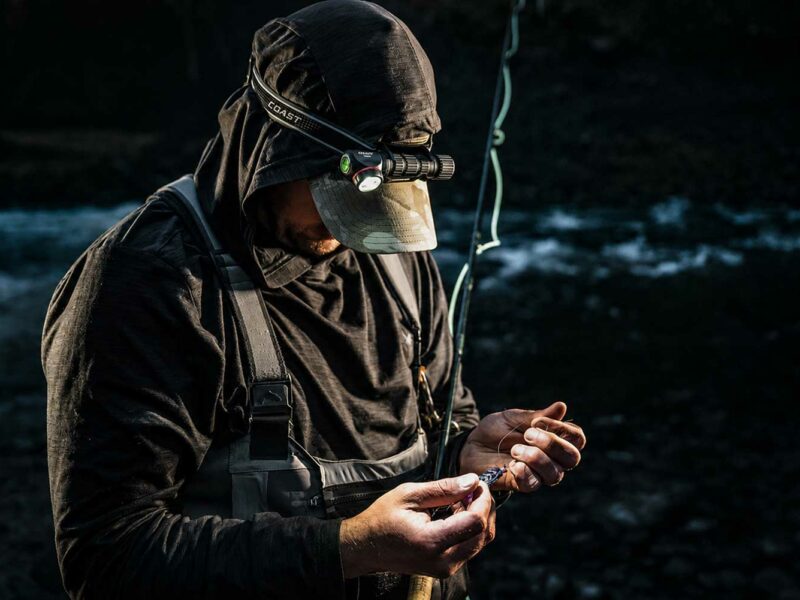 Schuecker Protextiles Messestand mit COAST Taschenlampen, Kopflampen und Outdoor Zubehör auf der Carp Austria Fischerei Messe