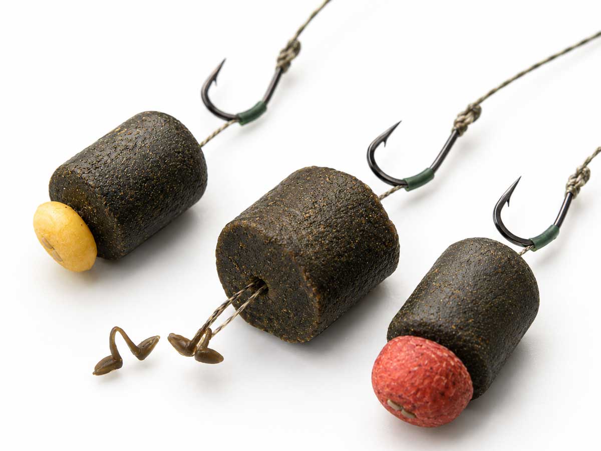 Halibut Pellets für Karpfen in verschiedenen Größen als Futter und vorgebohrter Hakenköder